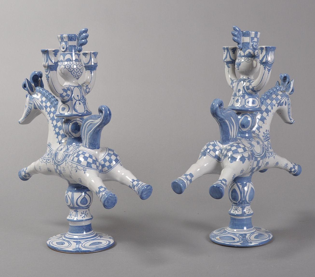 Bjørn Wiinblad. Pair of large rider stays in faience, rider on horse holding stakes, blue-crowned, sign. Monogram L. 20 Denmark, measures: H. 49, L. 40 cm. (2)
   