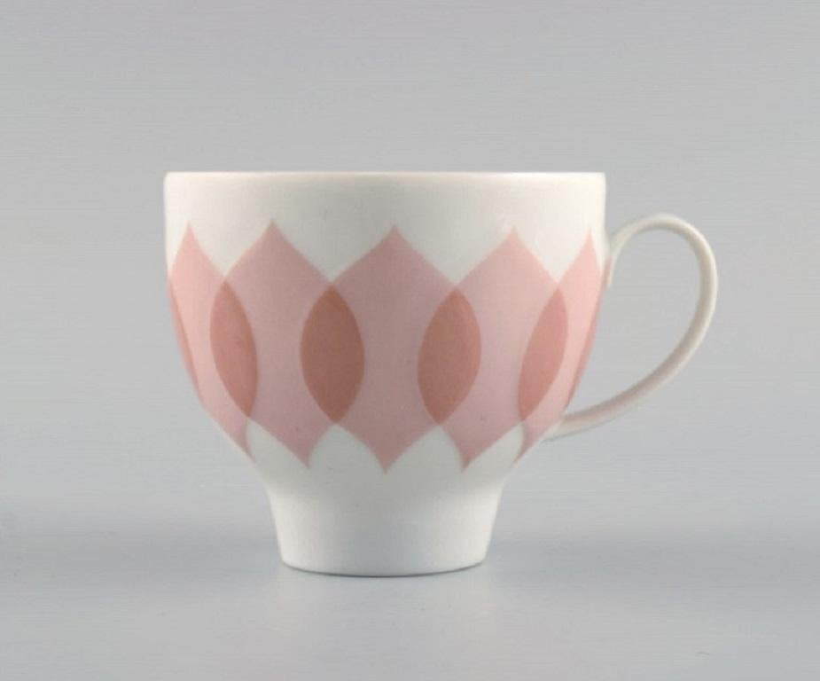 German Bjørn Wiinblad, Rosenthal, Lotus Porcelain Service, 9 Coffee Cups with Saucers For Sale