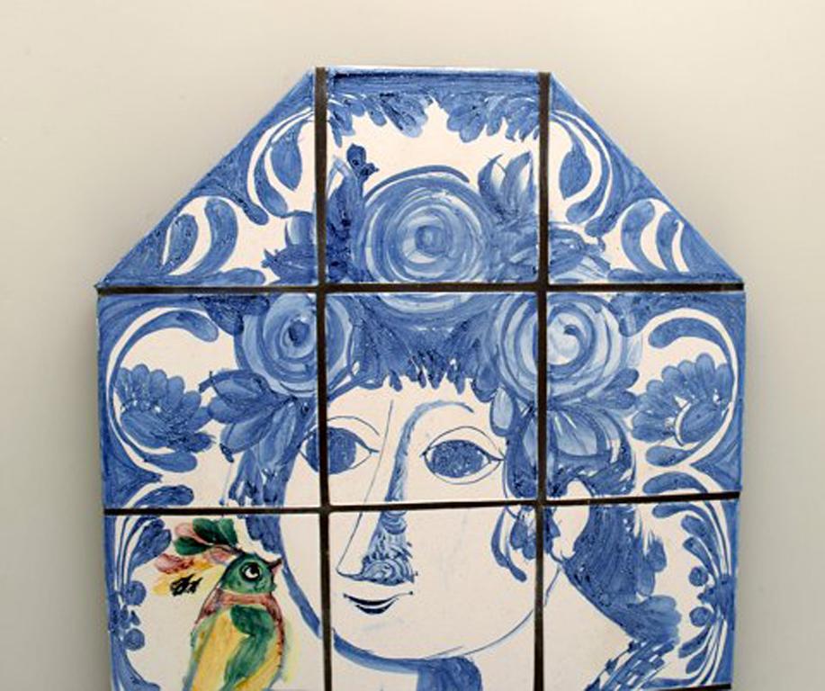 Bjørn Wiinblad. The blue house.
Very rare large wall plaque, decorated in blue with woman and bird. Dated 1973.
Measures: Height 61 cm, width 36.5 cm.
In perfect condition.
Signed and dated.