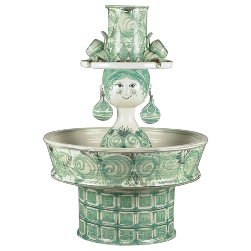 Bjørn Wiinblad. Unique colossal fountain. Woman
s bust with earrings and hat