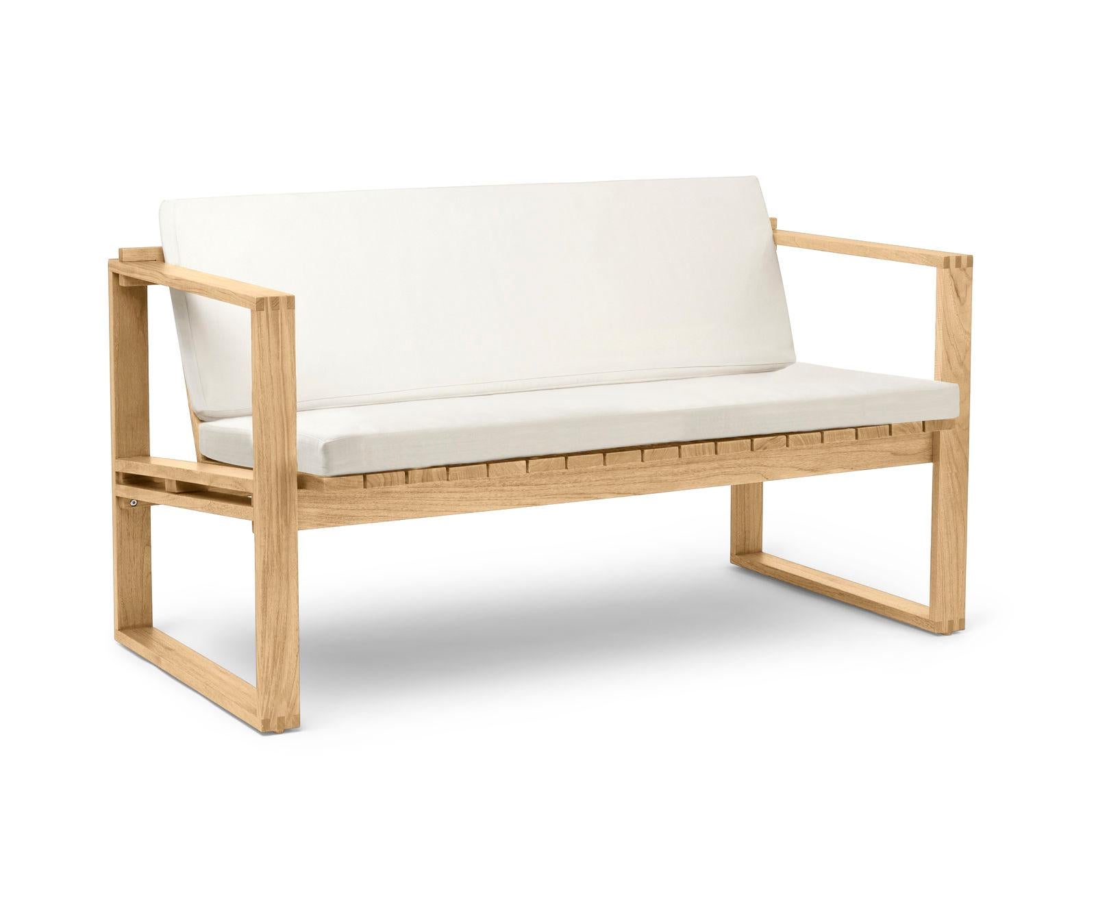 In 1959, Danish architect Bodil Kjær launched her Indoor-Outdoor series, which included the supremely comfortable BK12 lounge sofa. Crafted from solid teak with a slatted seat and back, the sofa displays the same geometric sensibility that underpins