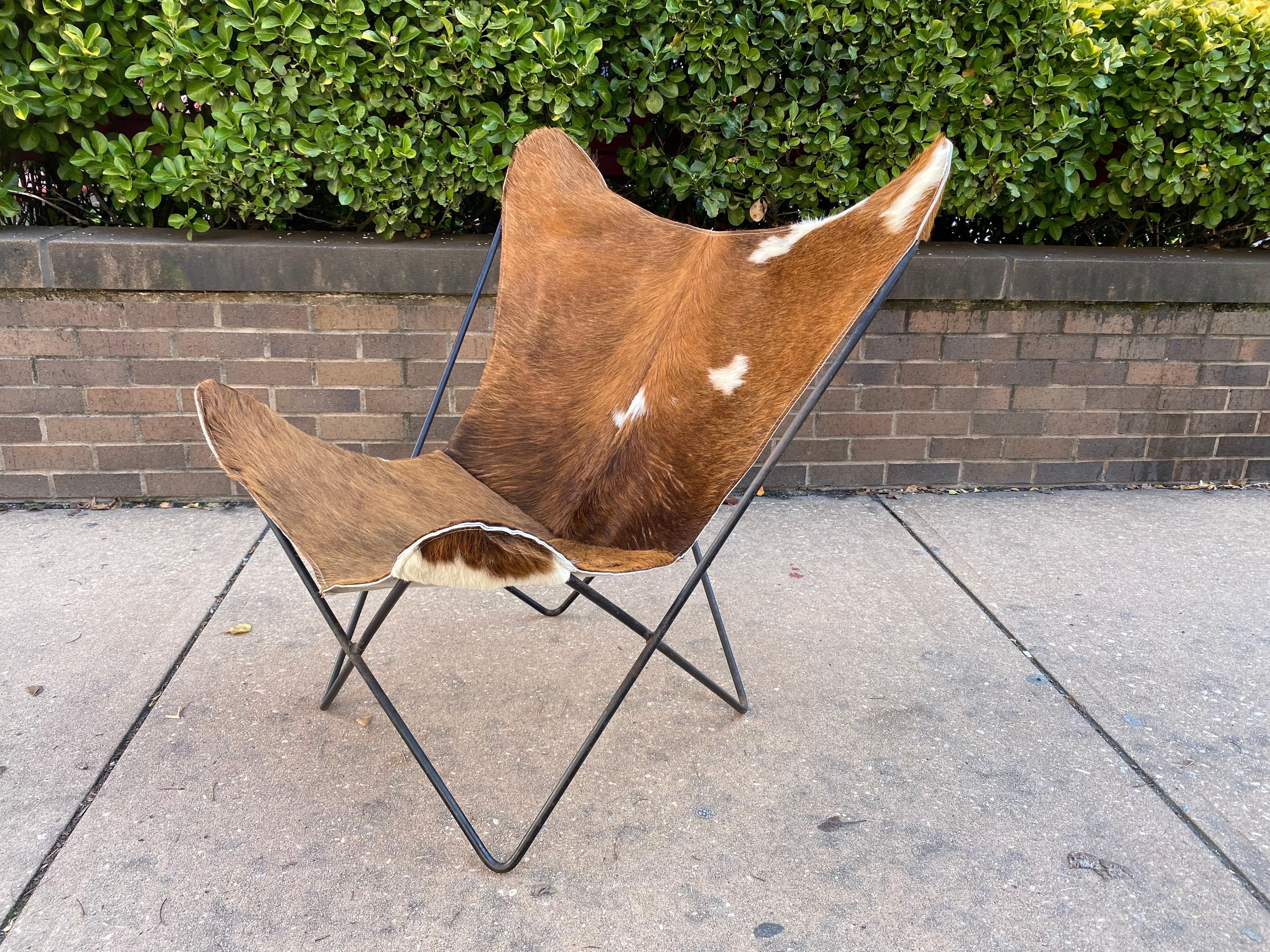 Hardoy for Knoll Butterfly Chair that date to the mid-60's.  New Cowhide Sling gives it a fun look and feel!