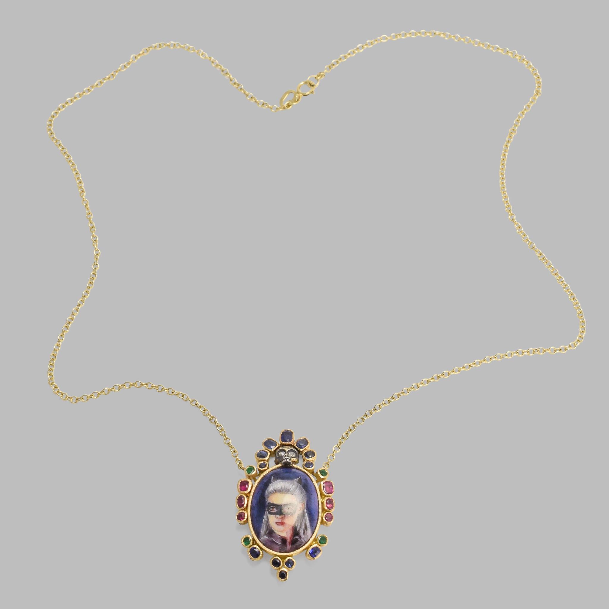 BL Bespoke Collection

A beautifully worked necklace, made by hand in the Georgian style. The finely painted portrait depicts a lady in masquerade with striking grey hair and cat ears. A diamond-eyed skull sits atop the portrait, with a border of
