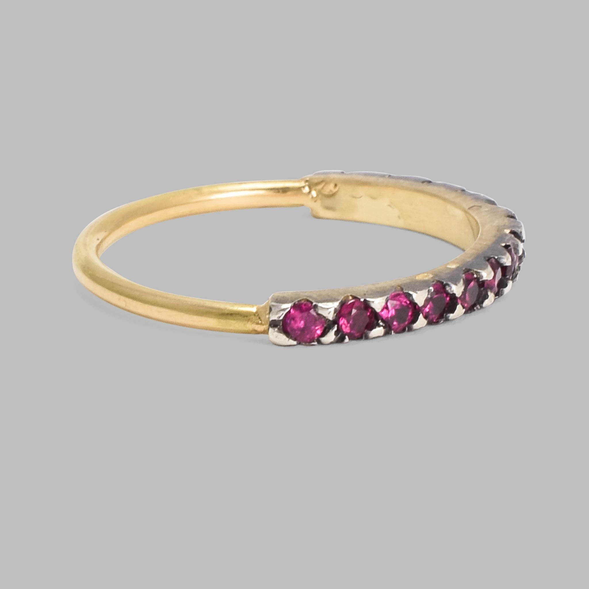 BL Bespoke Collection

The perfect stacking band.

A Georgian-inspired half hoop band set with a row of natural rubies in silver mounts. The ring is complete by a simple 18 karat gold band, made entirely by hand in London, England. It's a classic