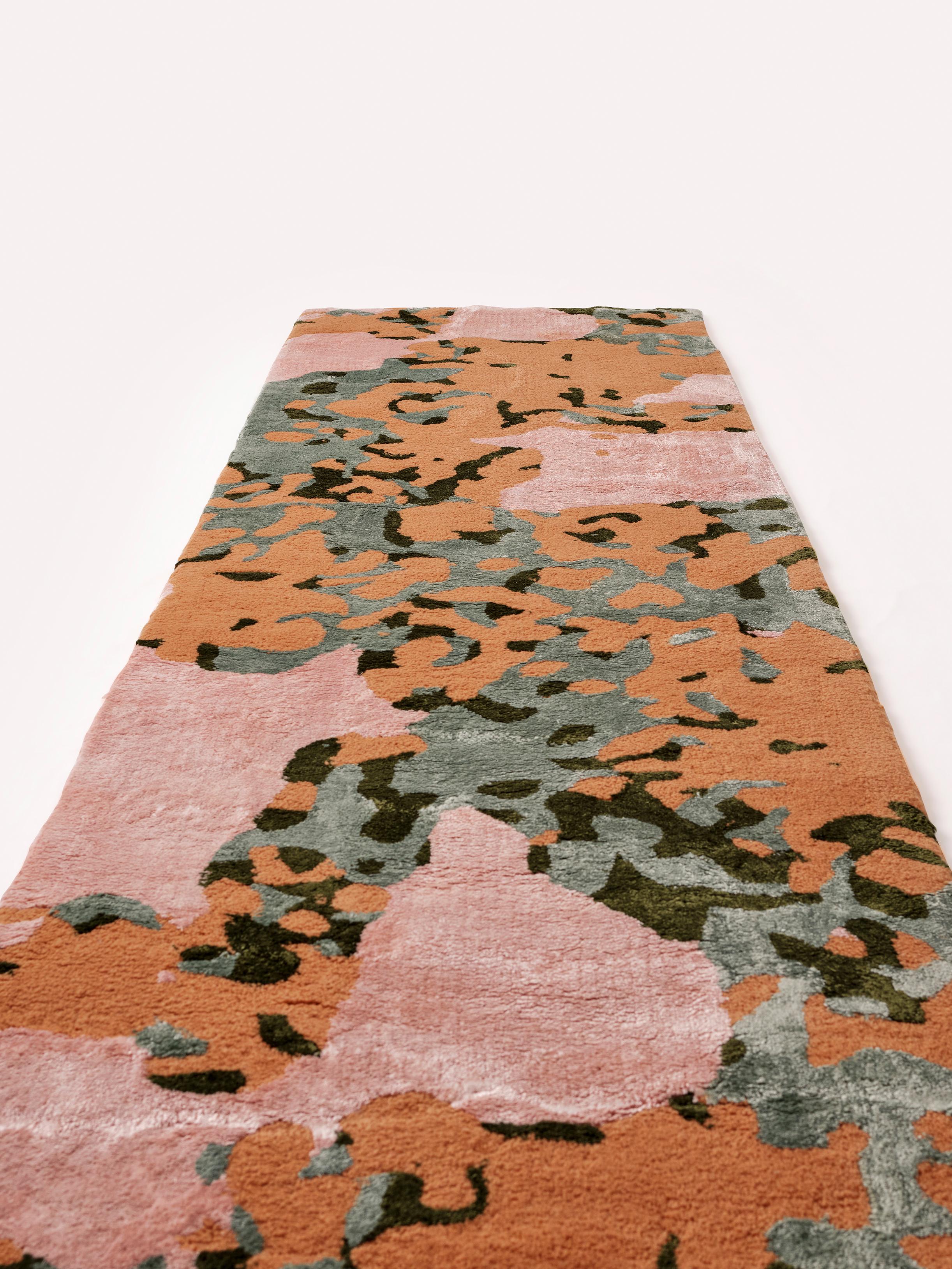 BLAB Rug is an end result of a zoomed in drawing made on i-pad . By experimenting with different digital brushes, this runner/rug is created by blending pink, blue, green and brown colors. Blab is made of wool & viscose and can be produced in custom
