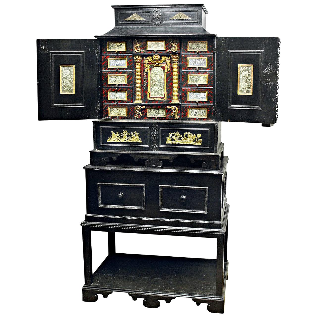 A Black 18th Century Flemish Ebonized Cabinet on Stand with Brass Ornamentation For Sale