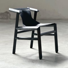 Dining room chair in wood and leather from Patagonia, black finish