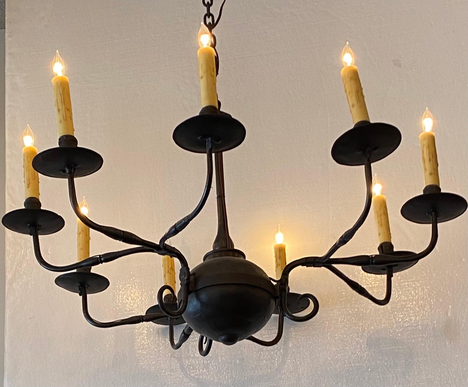 Paul Ferrante black iron chandelier 9 lights.