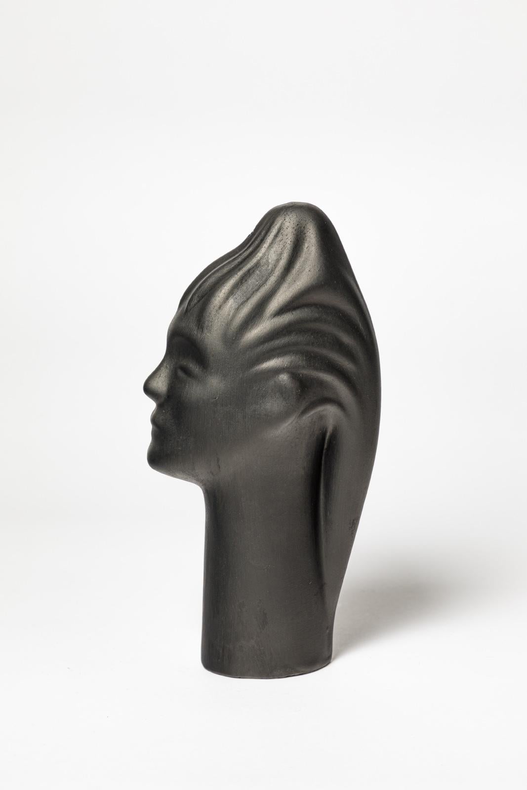 escultura figurativa en cerámica negra de diseño del siglo xx visage de Le Vaucour 1950 Francés en venta