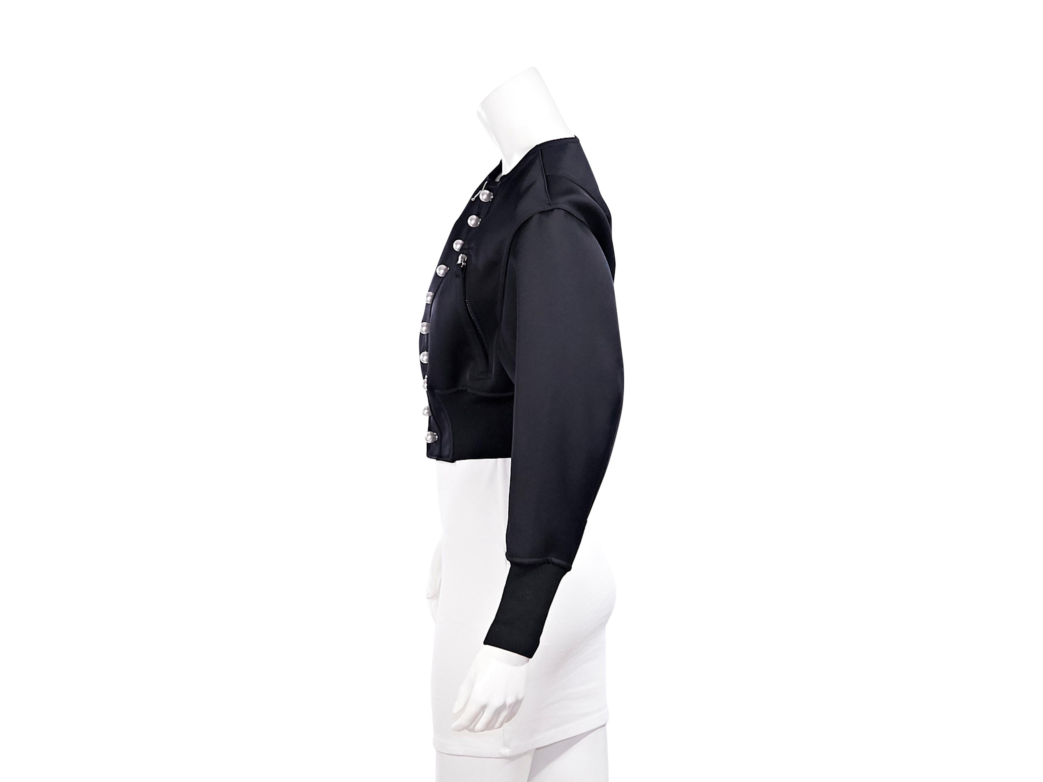 Product details:  Black cropped jacket by 3.1 Phillip Lim.  Trimmed with pearl beads and grommets.  Crewneck.  Long sleeves.  Zip-front closure.  Chest zip pockets.  Wide ribbed cuffs and hem.  36