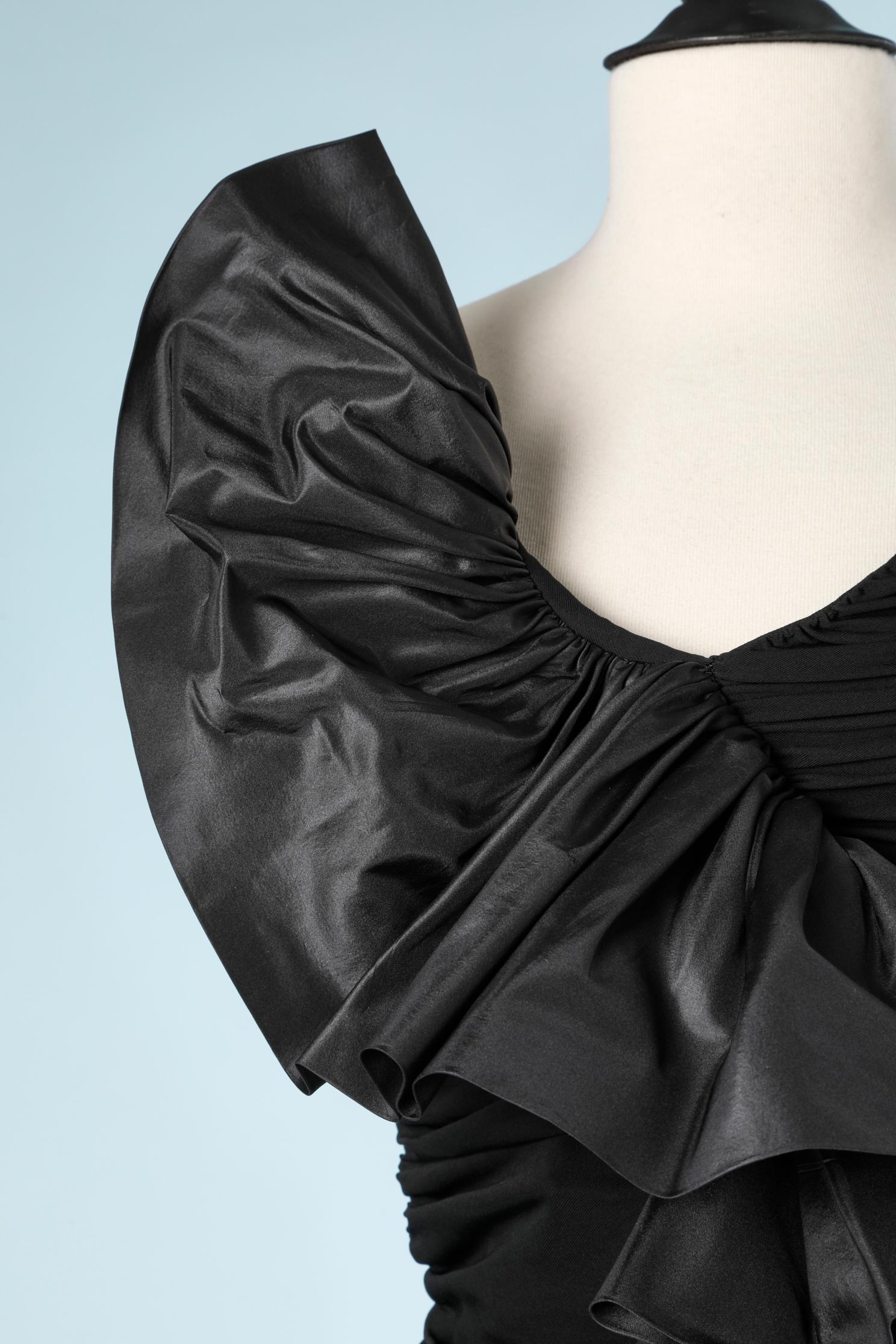 Black 80's bustier dress in viscose( rayon)  and taffetas ruffles.