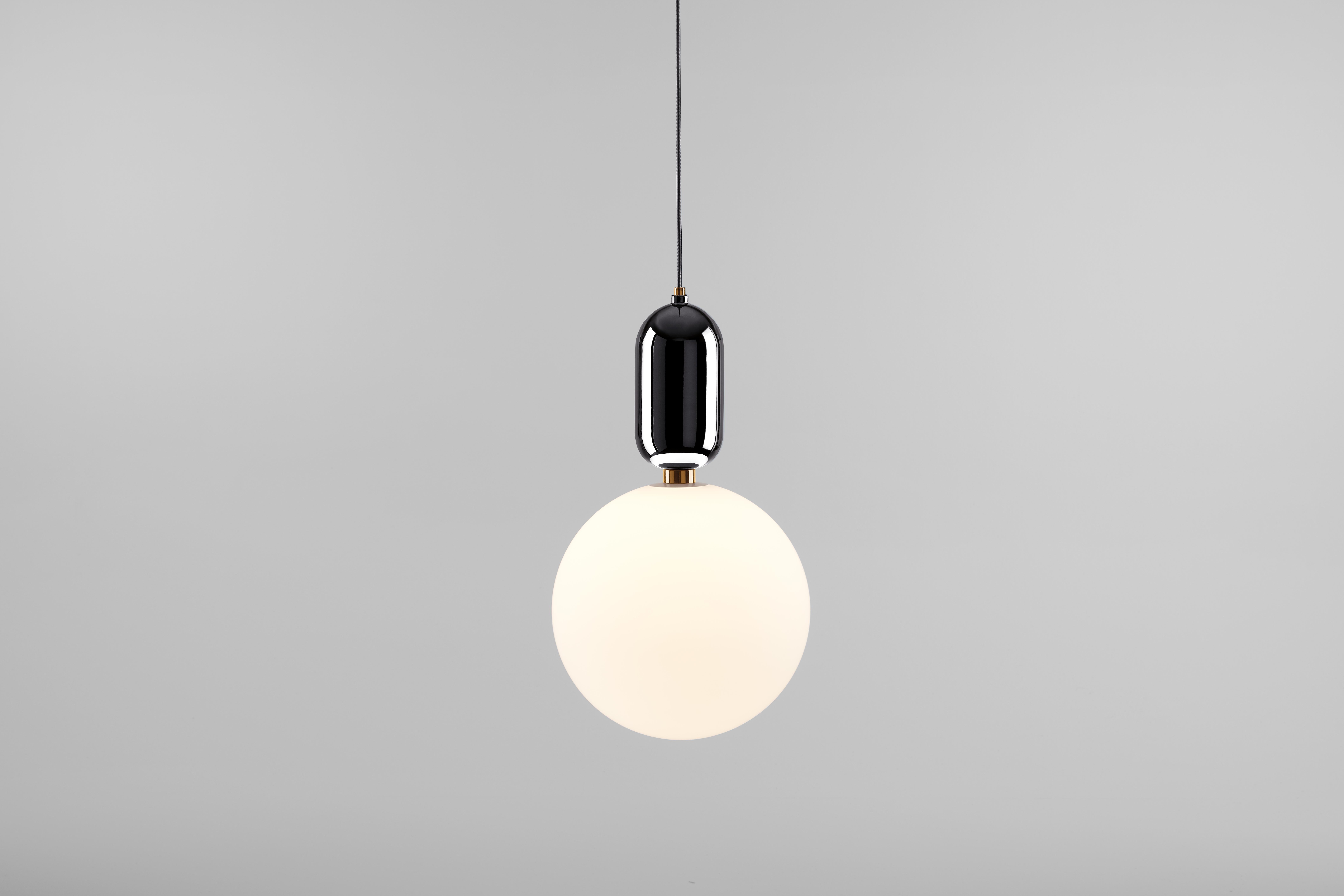 Black Aballs T Gr Pendant Lamp by Parachilna
Dimensions: D 40 x H 70 cm. 
Materials: Handmade ceramic body, Blown opal matt glass diffuser.
Weight: 5.2 kg

Shiny and eye-catching collection. Matching two nobel materials: ceramic and glass. Both