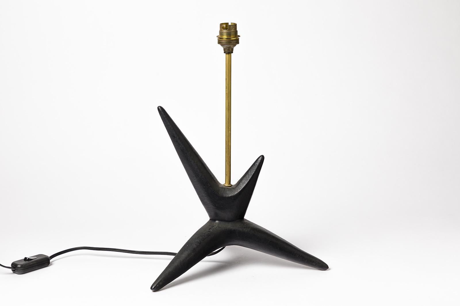 Black abstract ceramic table lamp

Mid-20th century design table lamp in ceramic with elegant black ceramic glaze color

Original perfect conditions,

circa 1950

Electric system is ok

Ceramic dimensions: Height 24cm, large