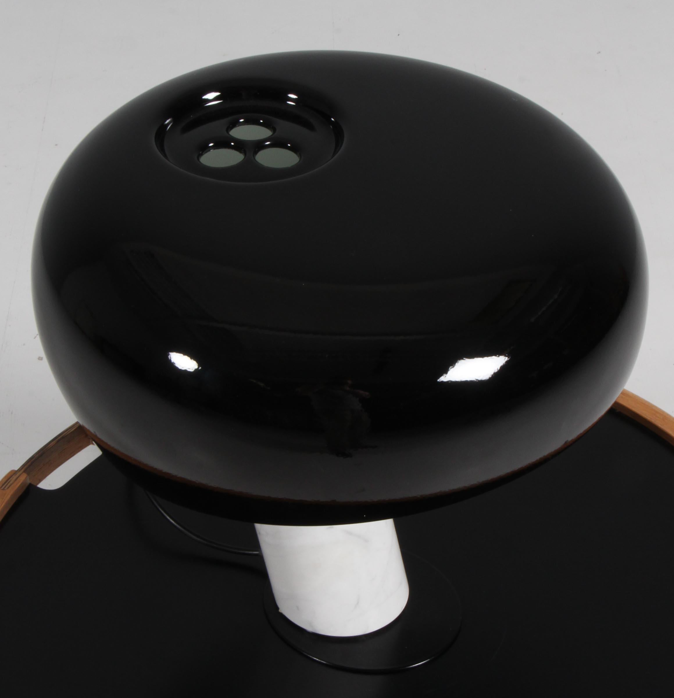 Achille & Pier Giacomo Castiglioni Snoopy table lamp. Dimmer operated lamp from 1967, with marble base and enameled metal shade. Up to 150 watts E27 socket.

This design from 1967 takes its light-hearted shape and name from the beloved cartoon