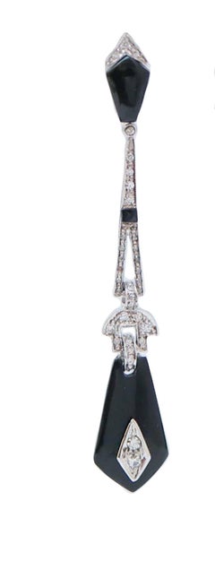 Ohrringe aus schwarzem Achat, Diamanten und Platin.