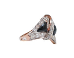 Bague en agate noire, diamants, or rose et argent.