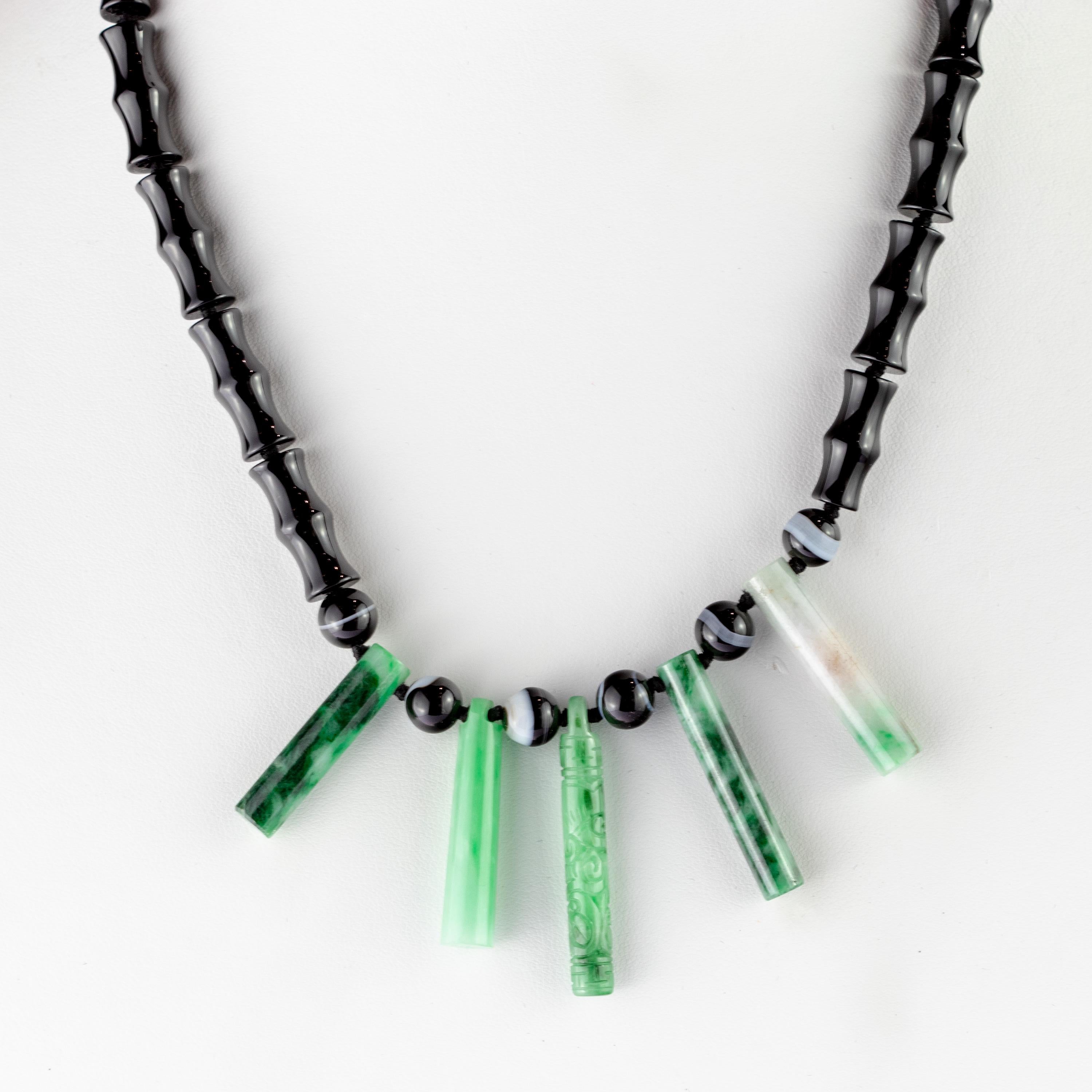 Chinese inspired design with black agate tubes and spheres with five jade pendants in a stick, thin and long shape (xx carat). Unrepeatable necklace full of tradition and colors in 925 sterling silver, deco and beaded jewellery piece. A boho style