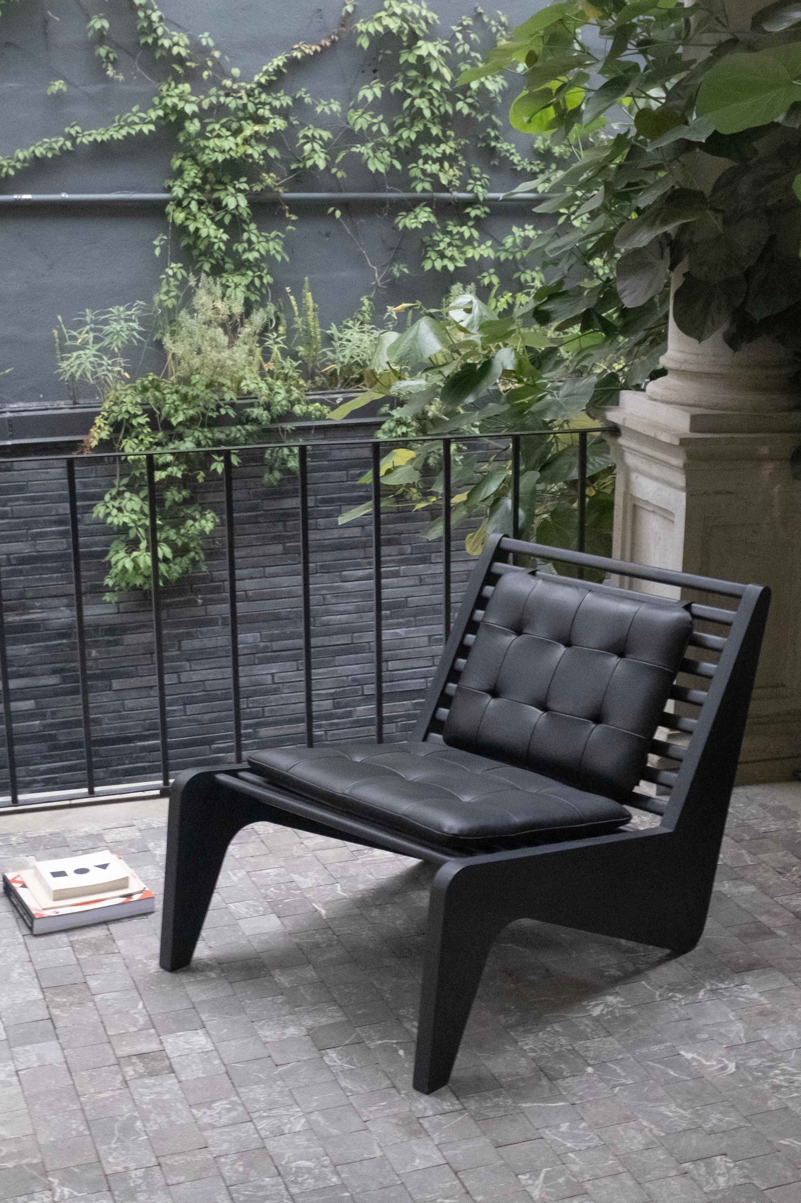 Black Ala lounge chair by Atra Design
Dimensions: D 50 x W 46.9 x H 76.9 cm
Materials: leather pads, mahogany
Available in mahogany or teak. Available in other color.

Atra Design
We are Atra, a furniture brand produced by Atra form a mexico