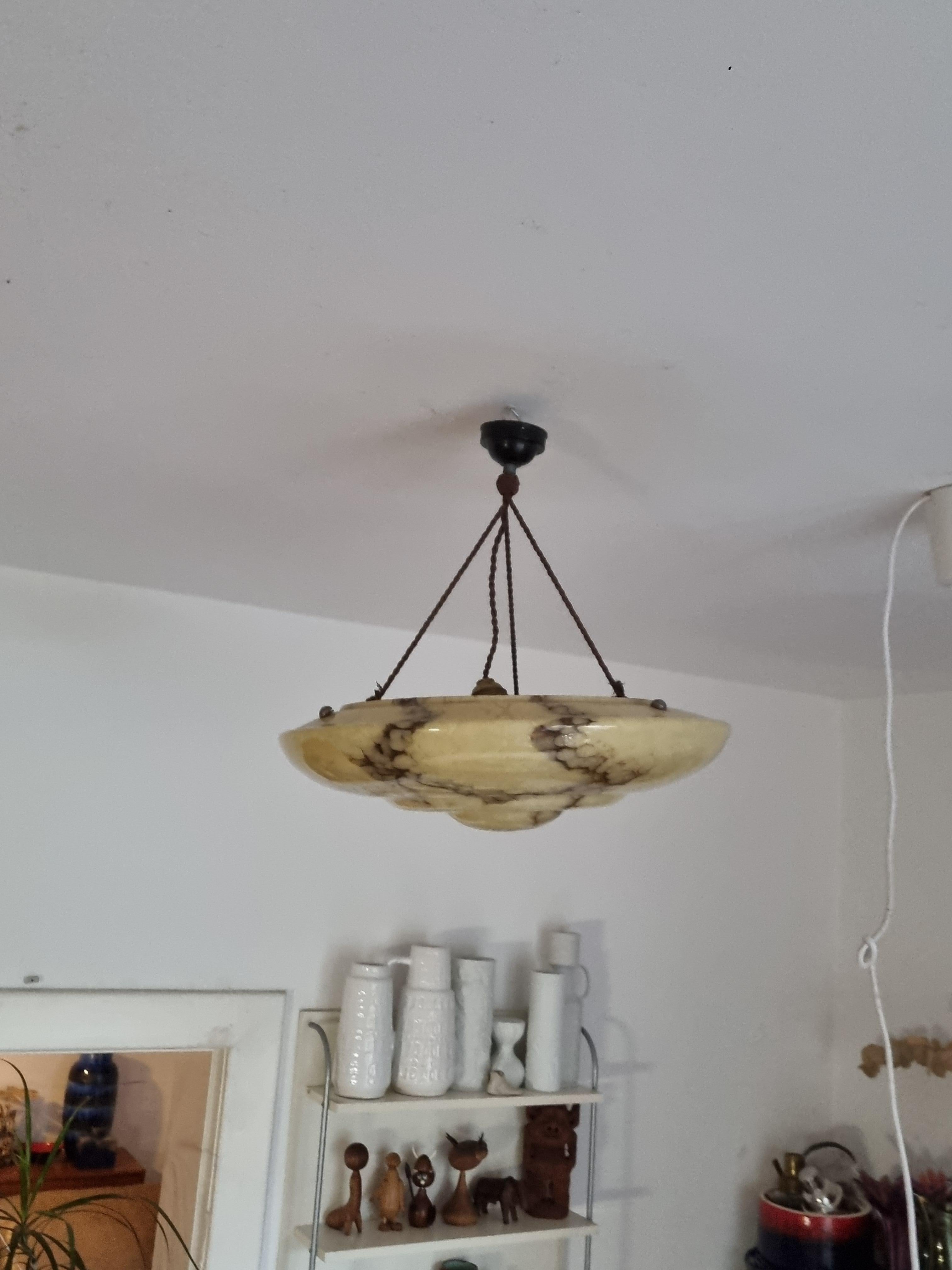 The lamp is an extreme good condition. Nothing has been changed, it is in it's original state and works (shines) perfectly. Hand carved, antique alabaster chandelier. This chandelier is white and black from top to bottom and the thunderstroke-like