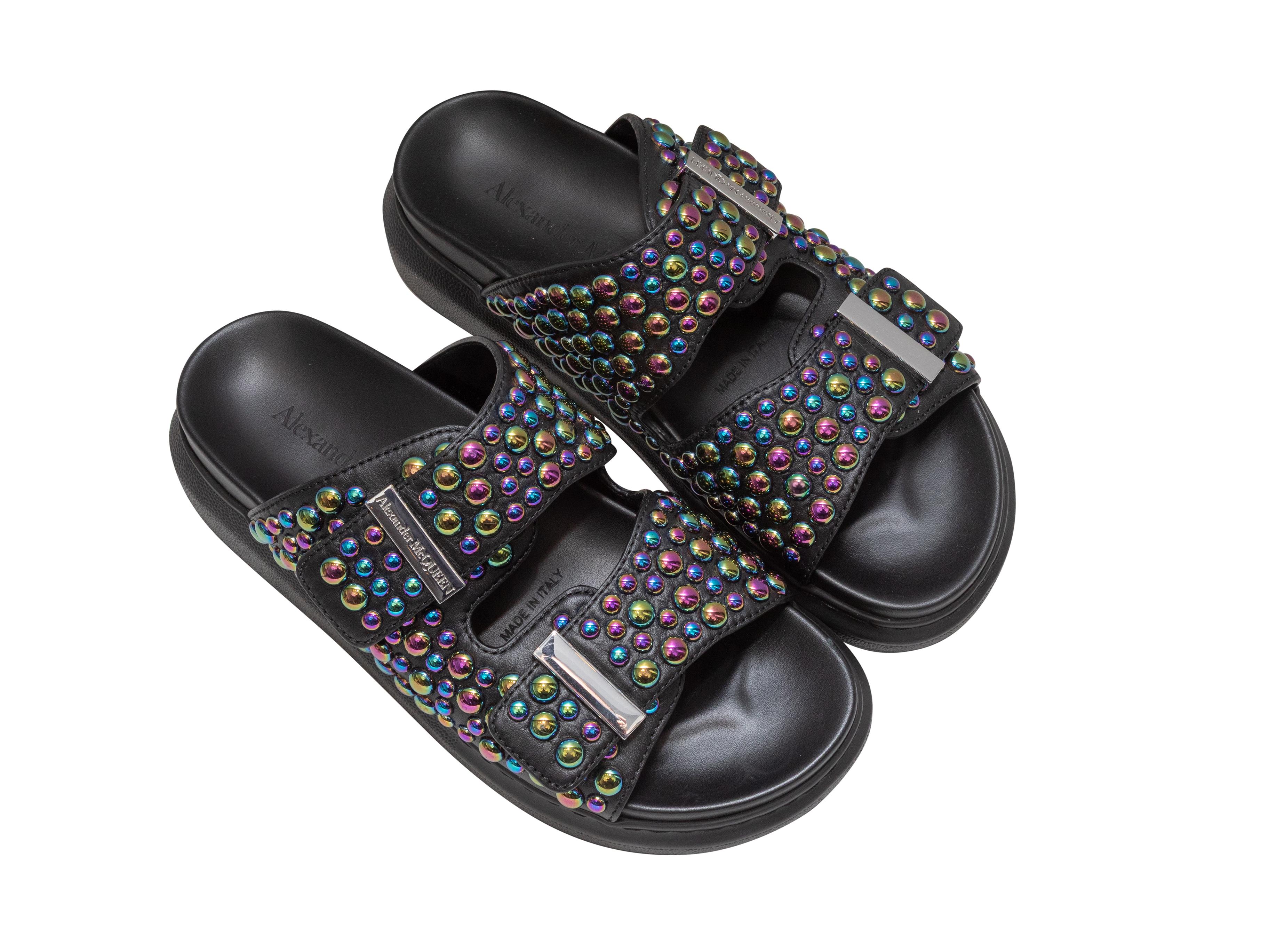 Product Details: Black iridiscent studded platform slide sandals by Alexander McQueen. Silver-tone hardware. 1