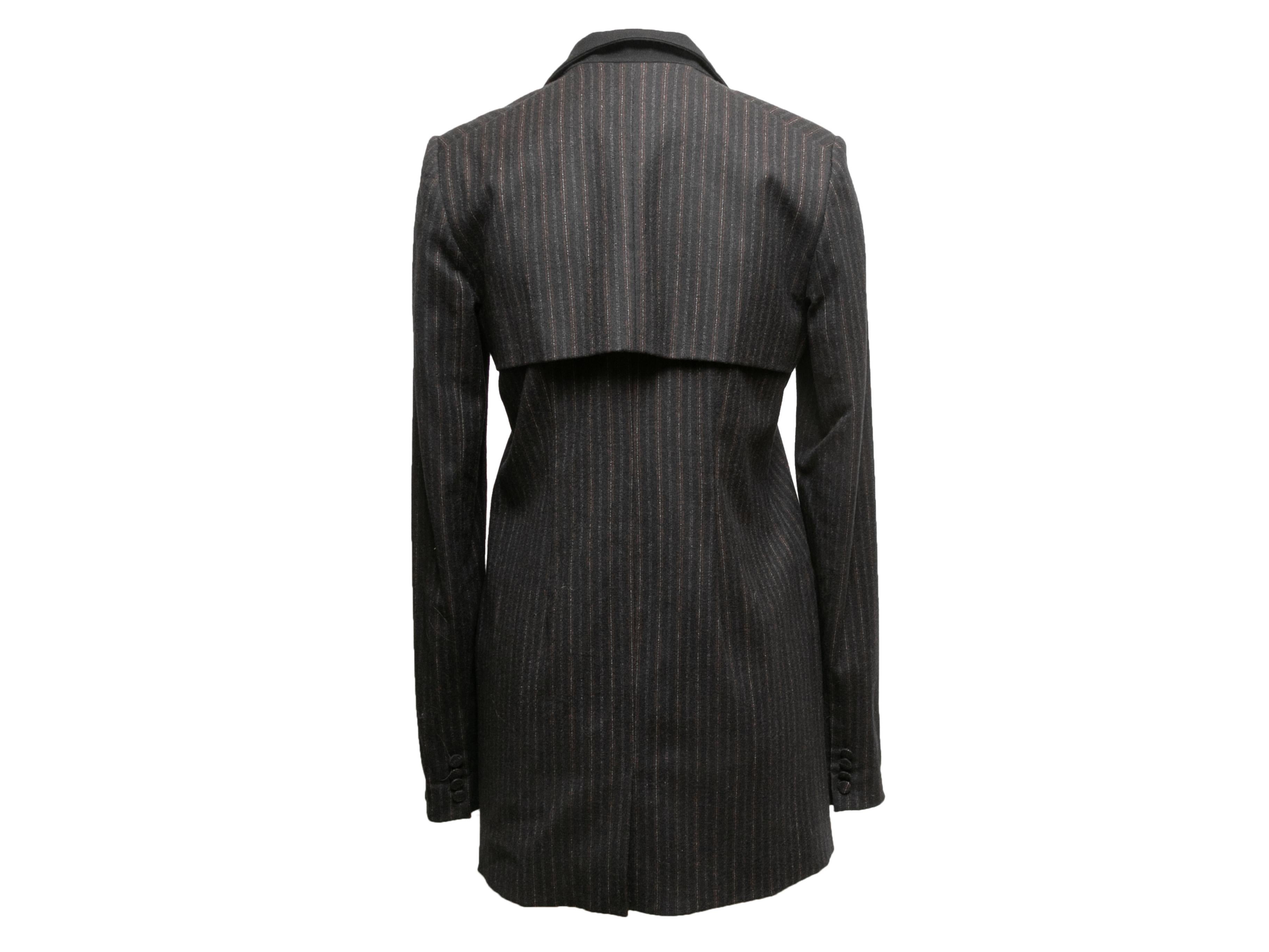 Black and grey Zucca patterned knit short sleeve top by Fendi. Crew neck. 34