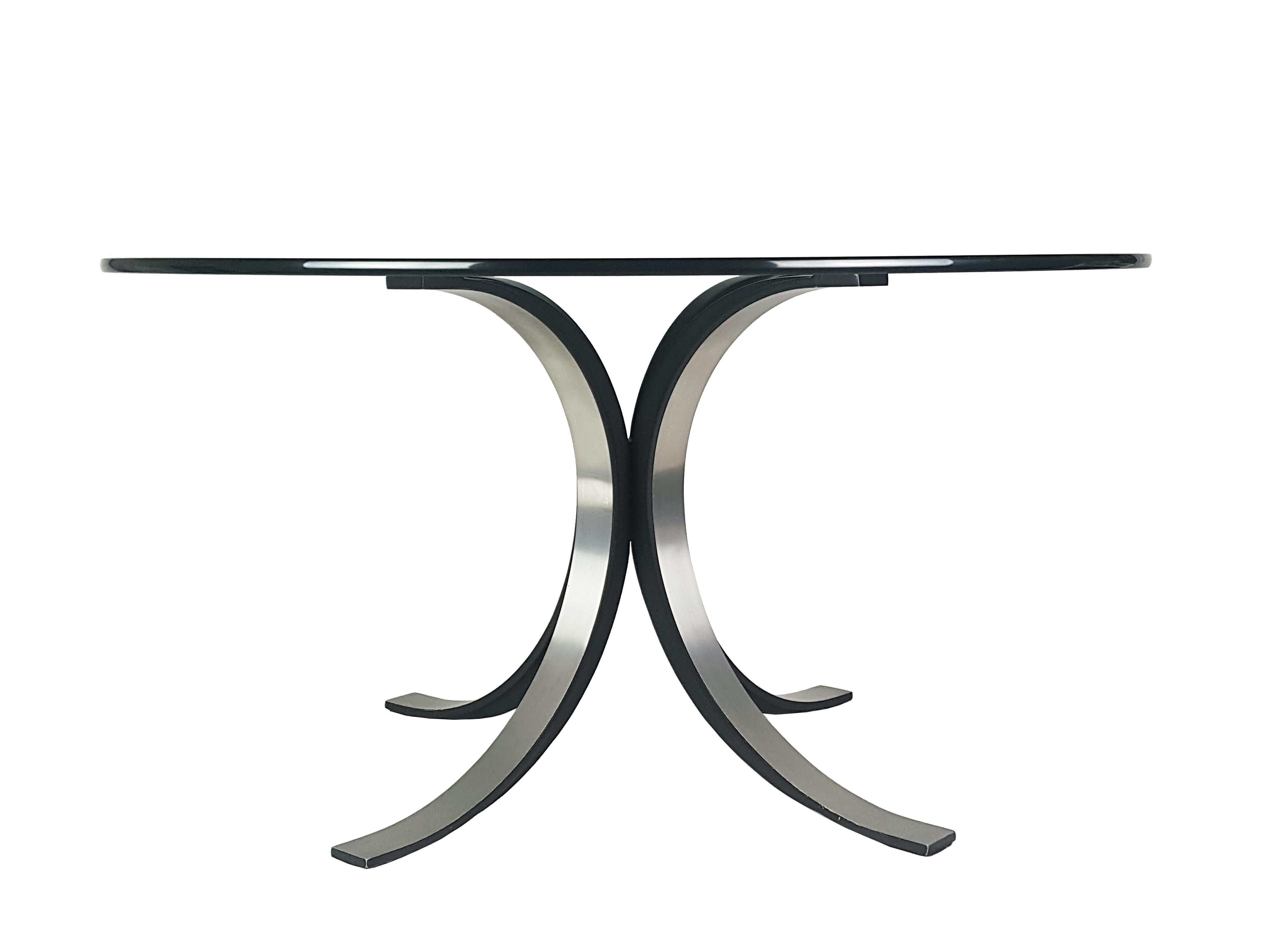 Round table composed by 3 simple elements: one thick tempered glass top set in place on 2 black and silver cast aluminum legs. Perfect vintage condition!