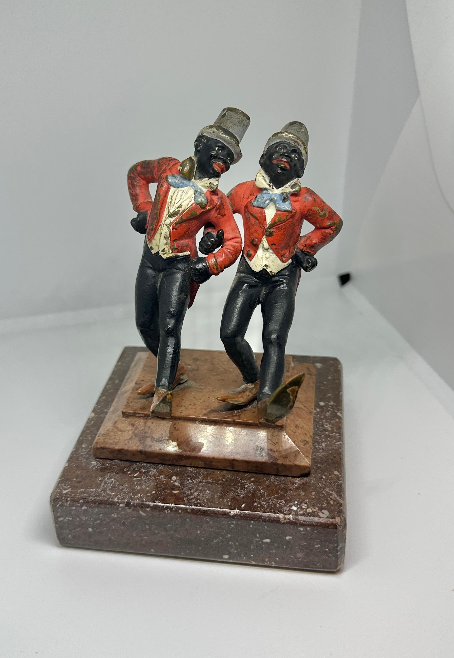 THIS IS A SUPERB AND VERY RARE PAIR OF TWO BLACK AMERICANA DANCING GENTLEMEN.  THE BRONZE SCULPTURES ARE ABSOLUTELY CHARMING ANTIQUE AUSTRIAN VIENNA BRONZE.
These wonderful antique Austrian Vienna Bronze (Bronze de Vienne, Wiener Bronze, Cold