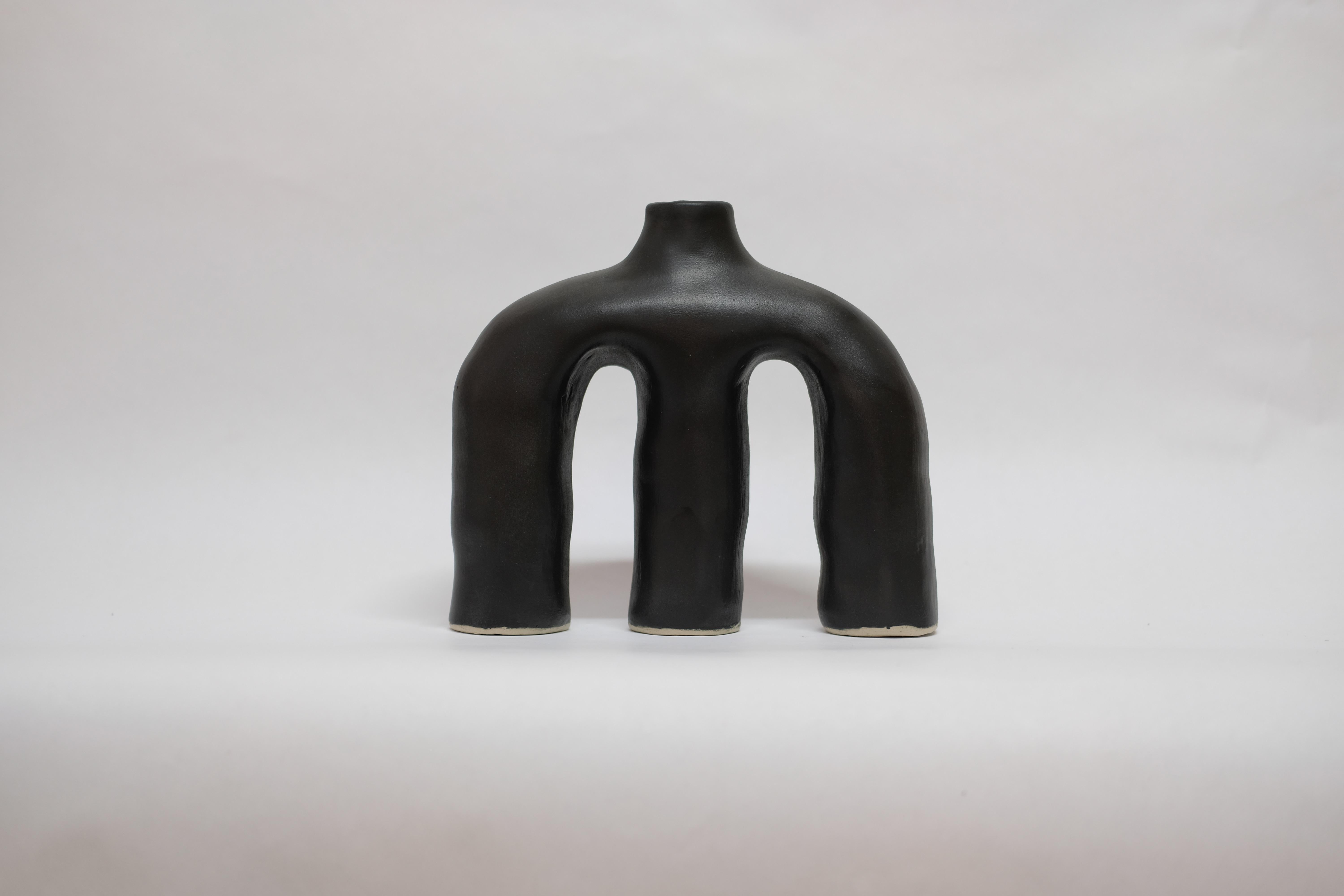 Black Anatomía Sutil stoneware vase by Camila Apaez
One of a kind
Materials: Stoneware
Dimensions: 25 x 8 x 22 cm
Options: white bone, butter milk, charcoal black

This year has been shaped by the topographies of our homes and the uncertainty