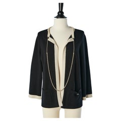 Black and beige cashmere cardigan with chain-neckless  Chanel