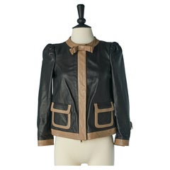 Giacca in pelle di agnello nera e beige con tasca e fiocco REDValentino