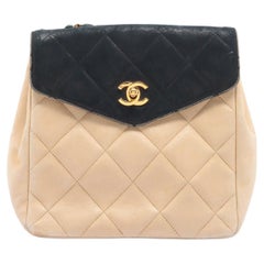 Schwarze und beige gesteppte Chanel CC Bicolor Umhängetasche aus Lammfell und Leder