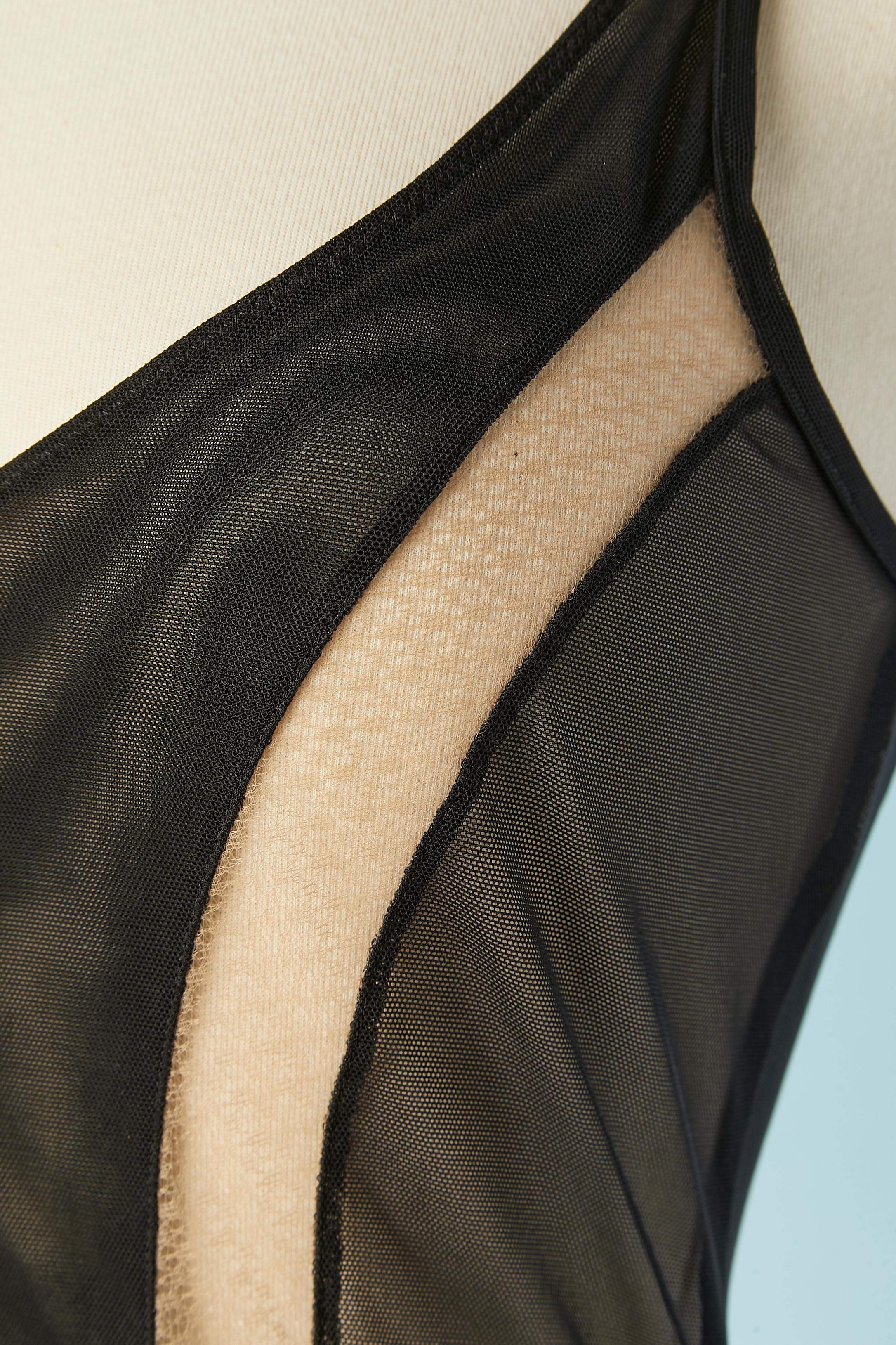 Schwarz-beigefarbenes, durchsichtiges Slip-Kleid aus Tüll mit Cut-Out. NEU mit Etikett.
Zusammensetzung des Stoffes: Nylon, Polyester, Elasthan, Tüll. 
GRÖSSE 38 (Fr) S (Us) 