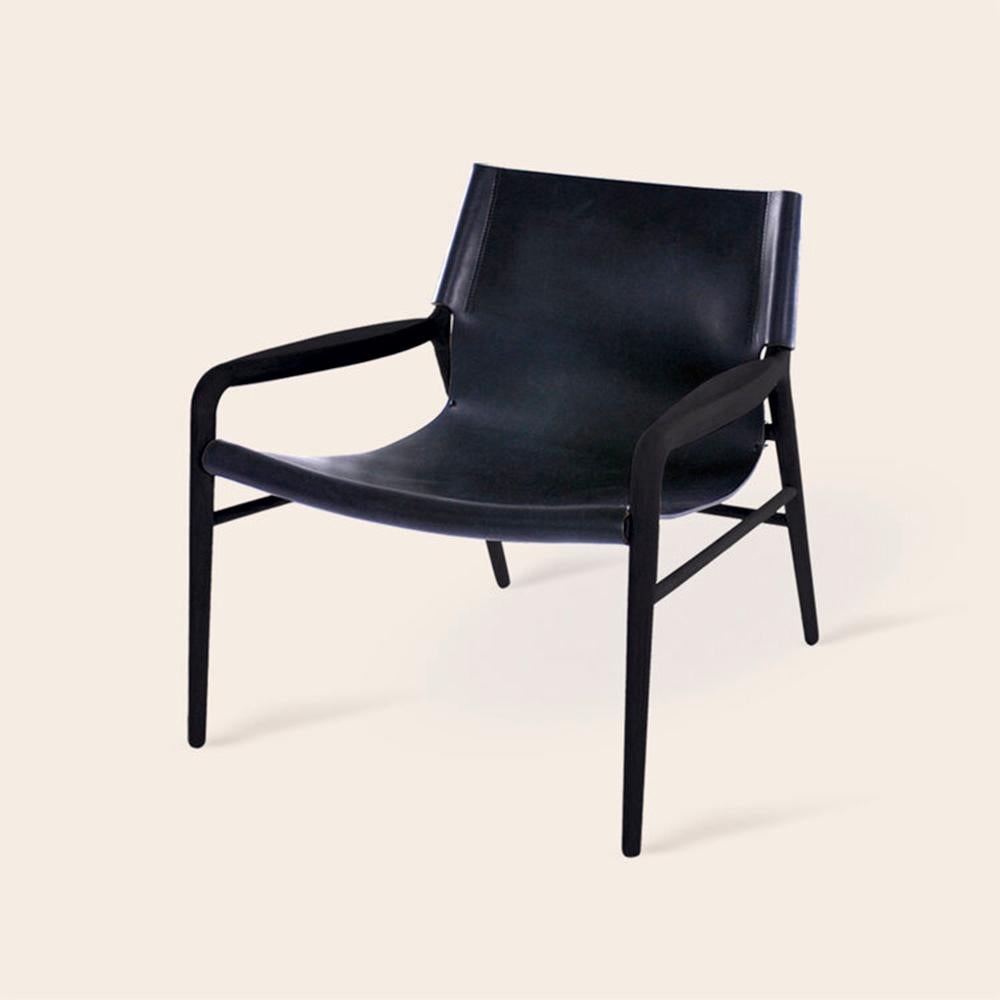 Black and Black Rama Oak chair by Ox Denmarq
Dimensions: D 72 x W 68 x H 70 cm
Materials: Leather, Wood
Also Available: Different colors available.

OX DENMARQ is a Danish design brand aspiring to make beautiful handmade furniture, accessories