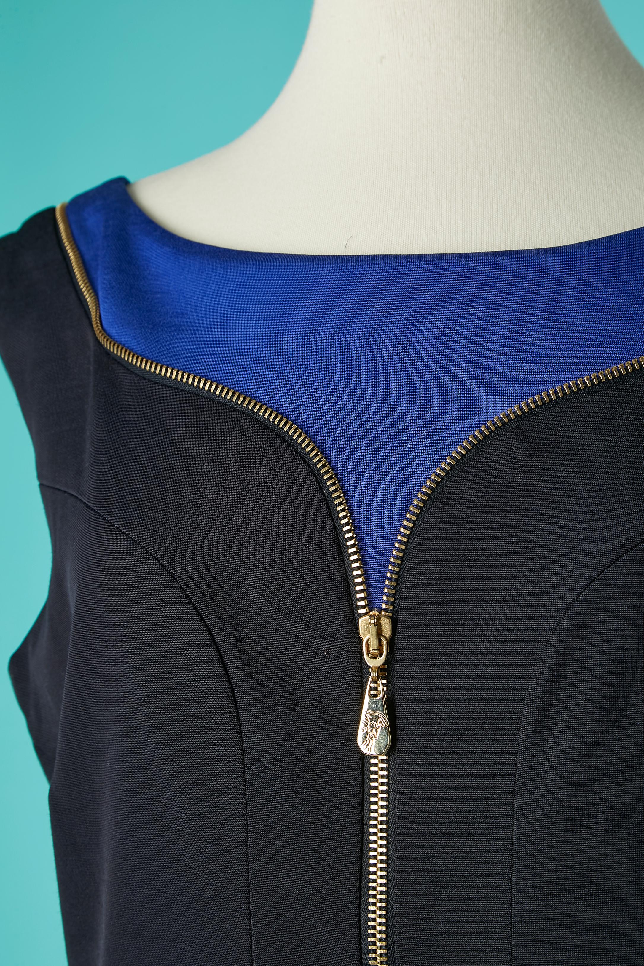 Black and blue cocktail dress with gold metal zip. Main fabric composition: 57% rayon, 41% modal, 20% stretch. Lining: 67% rayon, 33% PBT Elite 
The front gold zip is only decorative, there is an invisible zip in the middle back. 
SIZE 48 (It) 44