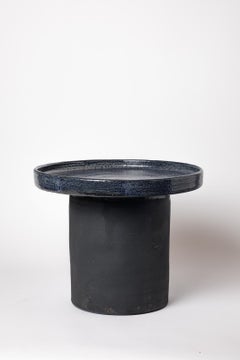 Black and blue glazed ceramic table by Mia Jensen, 2025.