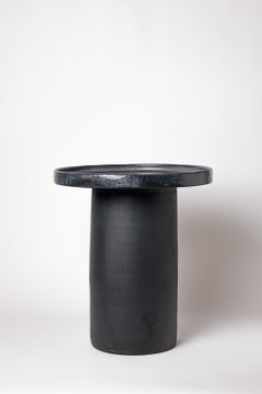 Black and blue glazed ceramic table by Mia Jensen, 2025.
