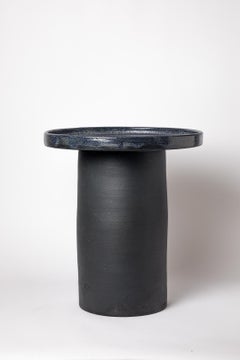Black and blue glazed ceramic table by Mia Jensen, 2025.