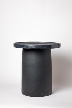 Black and blue glazed ceramic table by Mia Jensen, 2025.