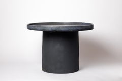 Black and blue glazed ceramic table by Mia Jensen, 2025.