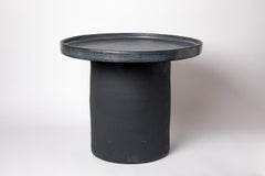 Black and blue glazed ceramic table by Mia Jensen, 2025.