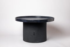 Black and blue glazed ceramic table by Mia Jensen, 2025.