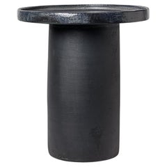 Black and blue glazed ceramic table by Mia Jensen, 2025.