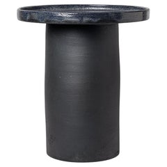 Black and blue glazed ceramic table by Mia Jensen, 2025.