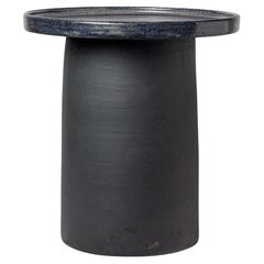 Black and blue glazed ceramic table by Mia Jensen, 2025.