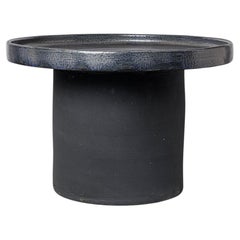 Black and blue glazed ceramic table by Mia Jensen, 2025.