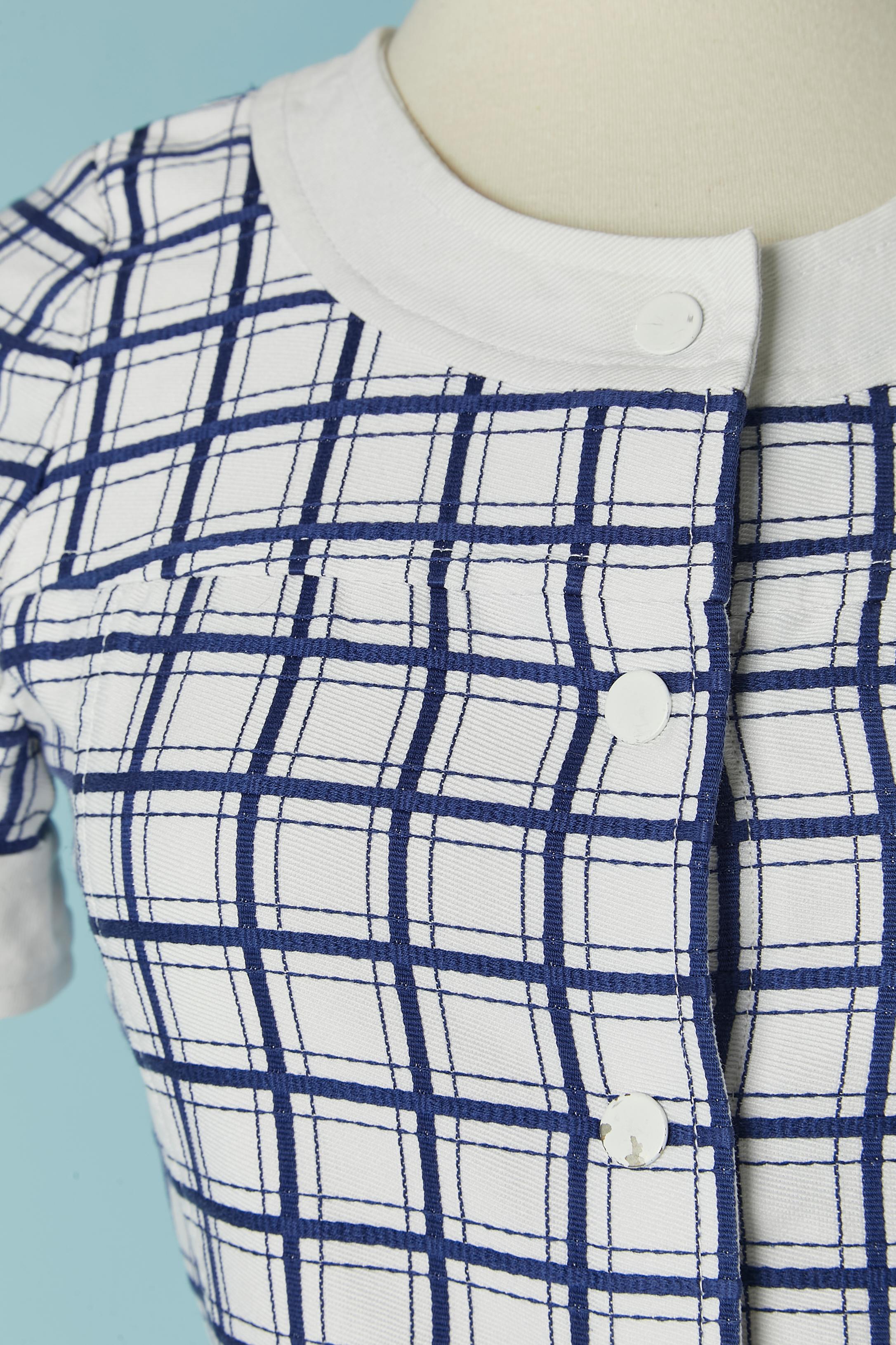Black and blue skirt suit with check pattern. 
Snap closure on the middle front ( some are damaged, see picture). Cotton lining inside the shoulders only.
SIZE 