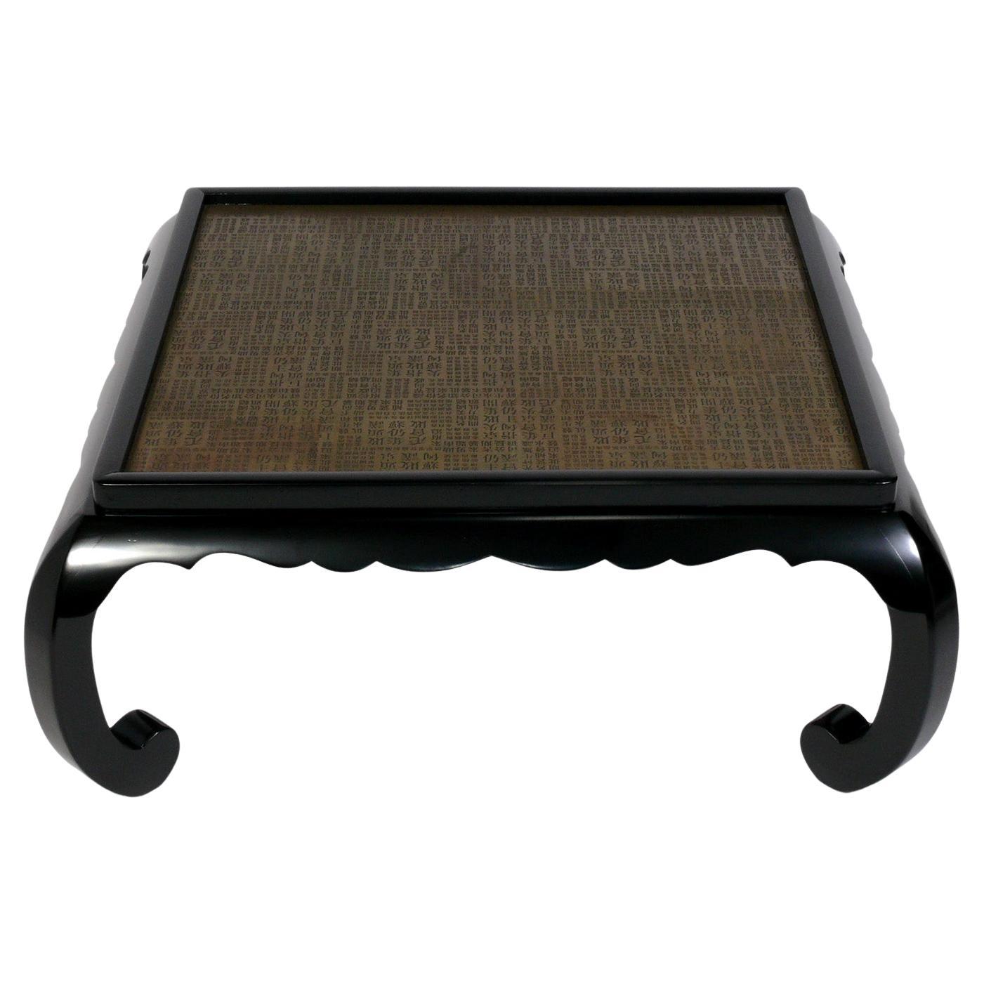 Table basse chinoiseries noire et laiton