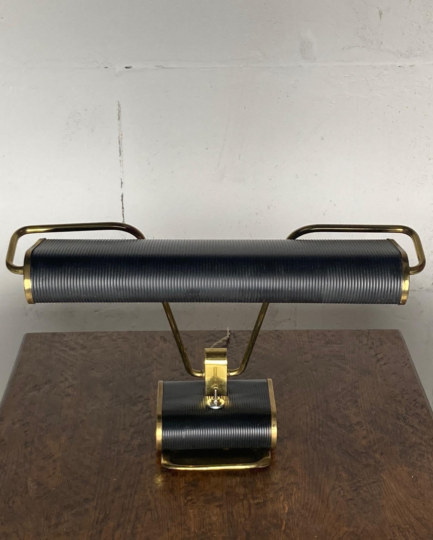 French Black and brass gold desk lamp model N71 by Eileen Gray for Jumo, France 1940s