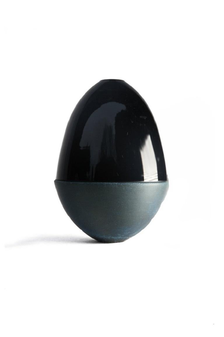 Black and brass patina homage to faberge jewellery egg, Pia Wüstenberg
Dimensions: D 13.5 x H 20.
Materials: glass, brass.
Available in other metals: brass, copper, brass patina.

The contemporary reinterpretation of the famous jewellery