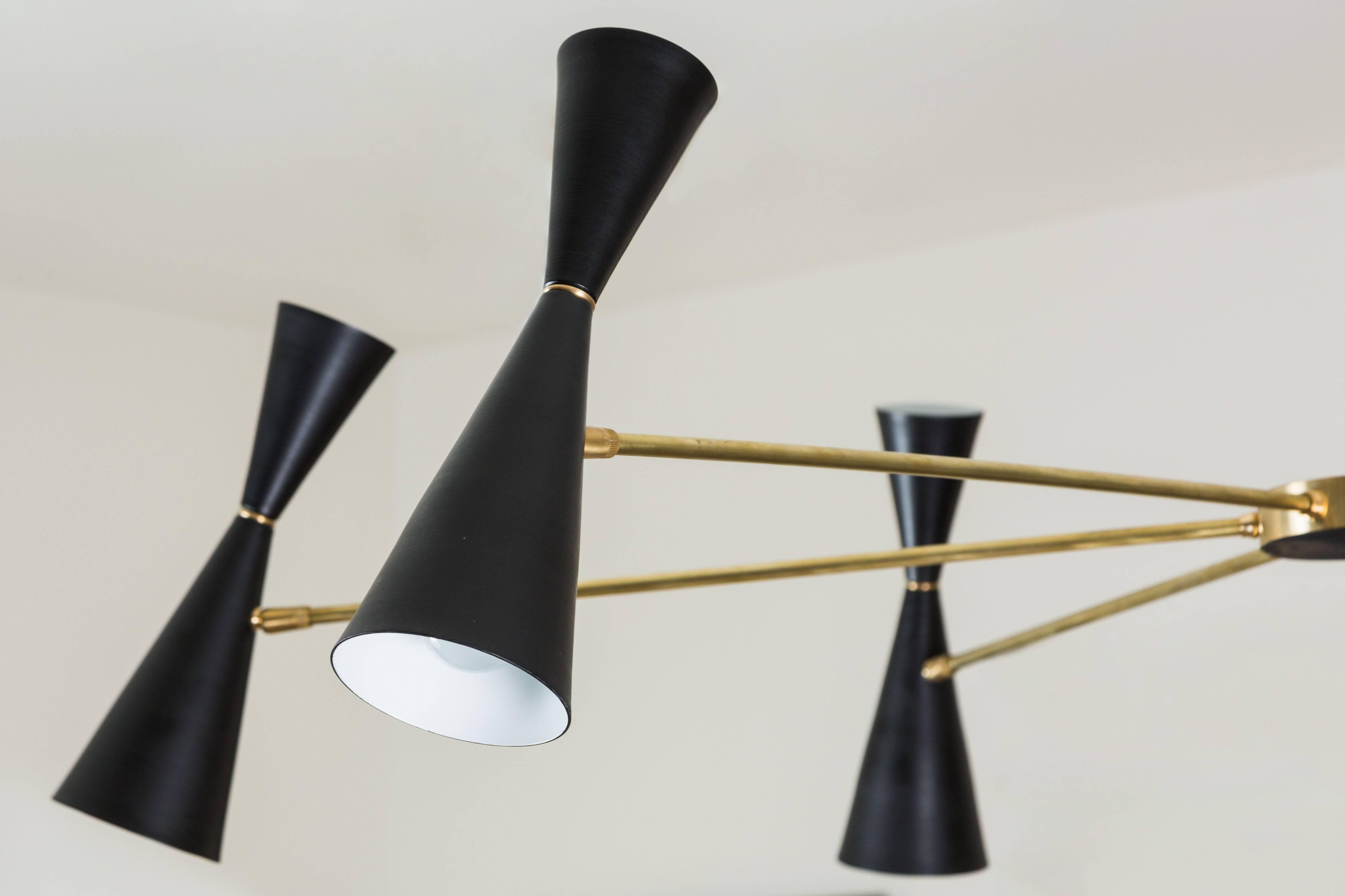 The Radial chandelier features six double cone shades that are centered around a spoked pendant. Available in gloss white or matte black powdercoat.

The Lawson-Fenning Collection is designed and handmade in Los Angeles, California.
 